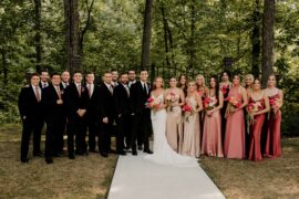 Bridal Party Portrait with Bridesmaids in Ombre Red and Pink Dresses