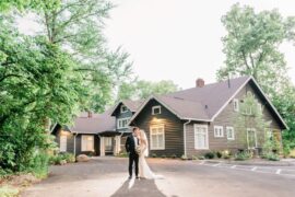 Bride and Groom standing in front of Fishers wedding venue